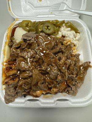 Chicken plate with extra beef, extra jalapeños and no green salad