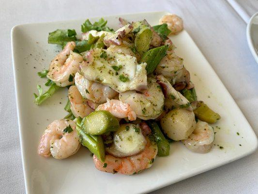 Seafood Salad with lemon vinaigrette... so good and so much seafood (shrimp, scallop, octopus)! Muy delicioso