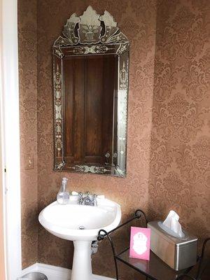 The downstairs powder room