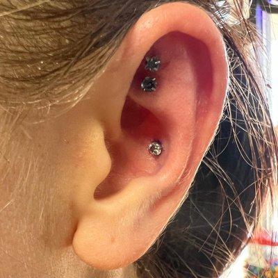 Double flat piercing and a conch