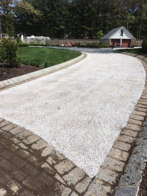 Beautiful tar and chip driveway laid by E Sprague and Sons paving. (Belgian block laid by different contractor).