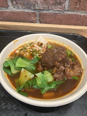 Stewed beef noodle soup with hand-ripped noodles