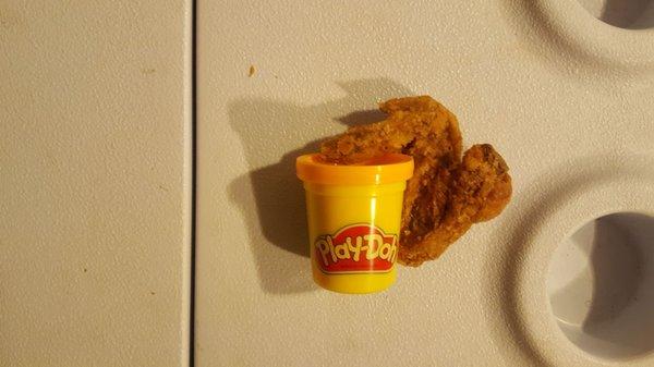 Tiny wings from hip hop chicken on Moravia Rd. Size of mini jar of play doh.   Smh waste of money.