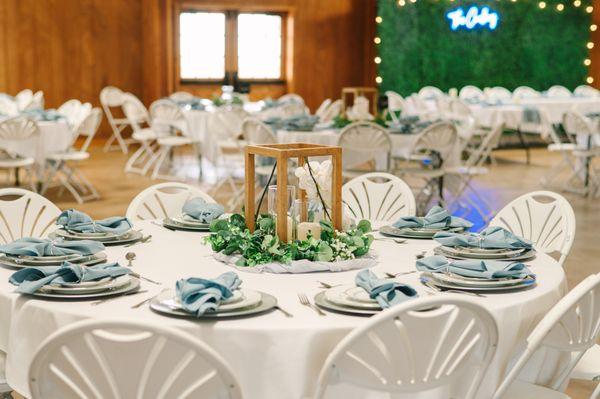 Indoor wedding reception tables and decor