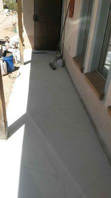 Patterned concrete porch before