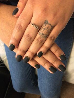 Matte black with Rhinestones by Tracy.