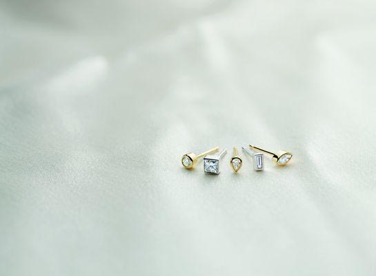 modern diamond and gold post earrings for everyday wear.