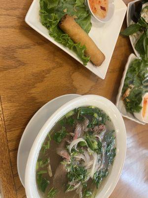 Pho with steak and fried egg rolls