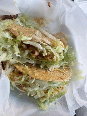 2 crispy shredded chicken tacos