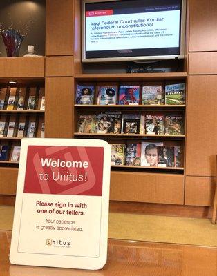 Waiting area! TV, magazines, and comfy seating!