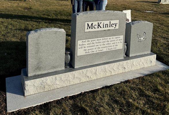 They didn't charge us extra for the text on the back of the headstone.  It turned out beautifully!