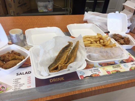 Wings, fried whiting, philly & fries