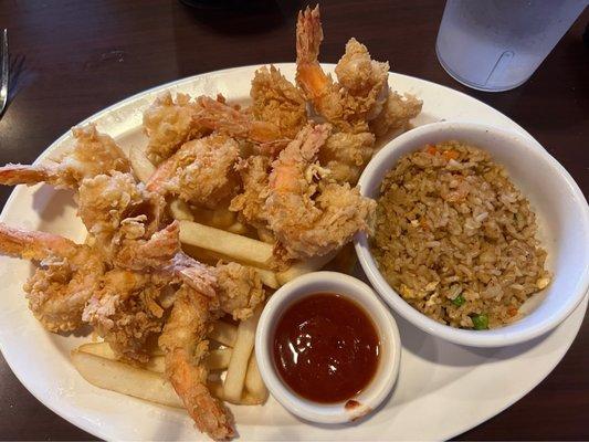 Fried shrimp, fries and fried rice.