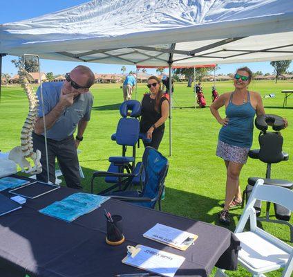 Giving chair massages and free consultations to the golfers getting out for the season!