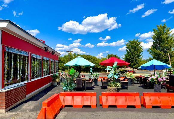 Their well decorated covered patio and outdoor seating