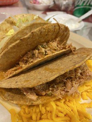 Shredded chicken hard shell tacos