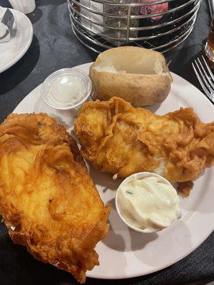 2 huge filet of fish baked potato side. Fresh bread and salad comes with meal. Fish pieces huge. Took full filet home to air fry tomorrow.