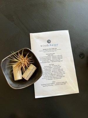 Today's wine list and a very happy air plant