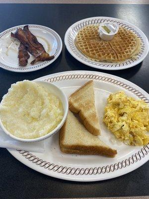 Bacon cooked well, waffle cooked light, grits, eggs scrambled with cheese and onions and toast.