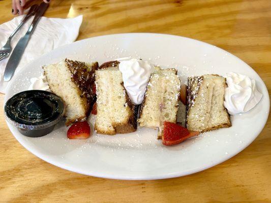 Stuffed French toast with mascarpone, strawberries and whipped cream. Wonderful!