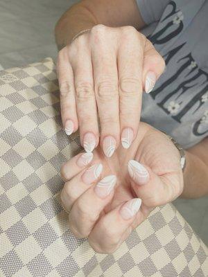 Theresa did each nail in a different design off the top of her head. I was floored! This is the almond shape that I've now become a fan off.