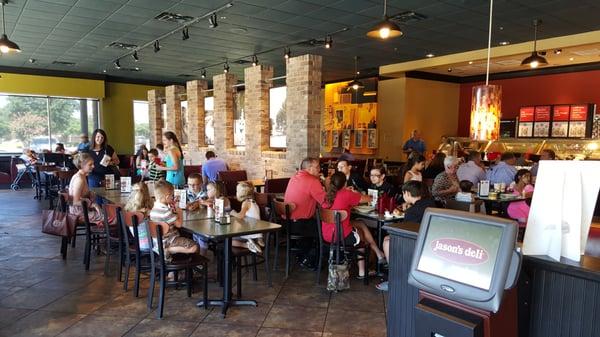 Sunday July 2015. Tables with kids in foreground had more kids and adults show up. Very popular with families.