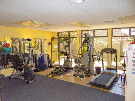 Main Gym Area Shown Here With Back Door Of Clinic Open To Provide Safe Exit Route For Patients After Treatment In Response to COVID-19.