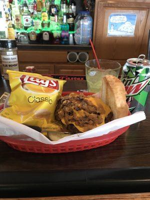 Cheeseburger with Fried Onions and bag of Lay's Chips