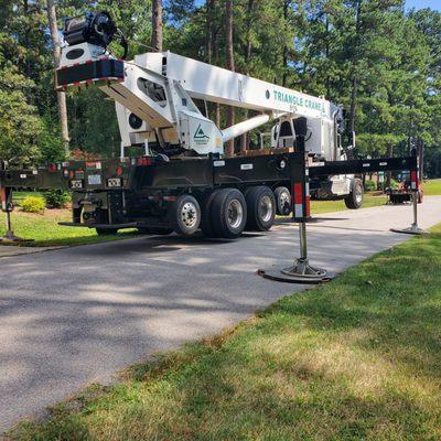 Protective crane padding to prevent street and yard damages.