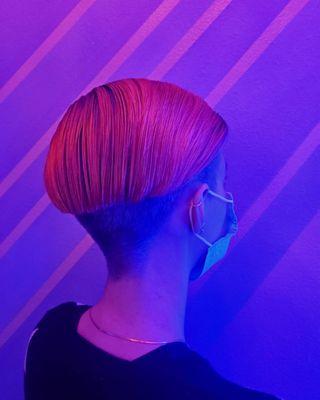 UV reactive orange undercut.