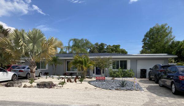 After the driveways were paved, including a walkway the front yard looks amazing.