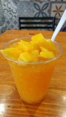 Raspado de mango (mango icee) not too sweet with fresh mango bits.