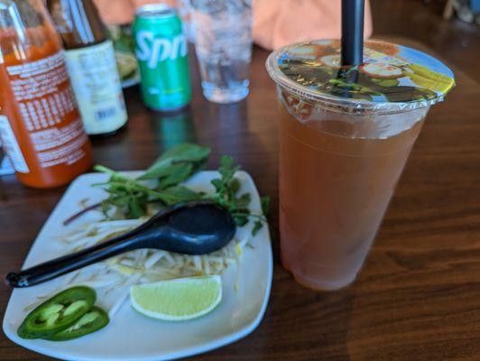 Pho fixings and peach tea