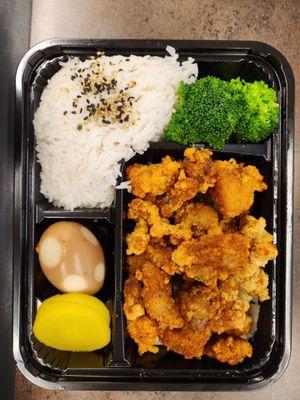 Popcorn chicken lunch box - broccoli, rice, tea egg, and daikon. Amazing portions!