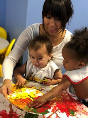 Toddlers have been learning about friends in their community. Together as a class, they created their very own  “friendship sensory collage”