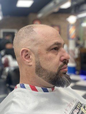 0-fade high, with a beard trim