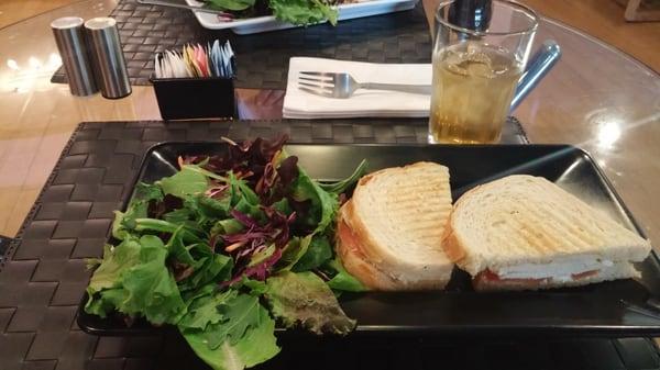 Greek chicken panini and iced green tea.