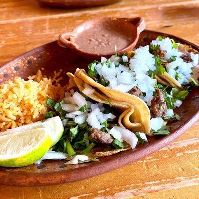 Street Tacos: Beef fajita & Barbacoa w/onions and cilantro