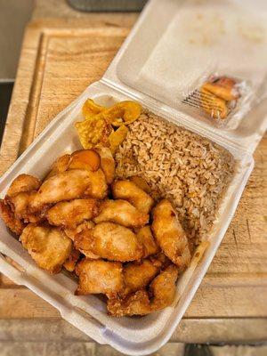 Orange Chicken comes with fried rice and a wonton. Fried rice has no other ingredients other than rice.