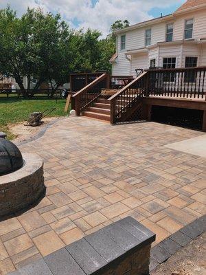 Patio with fire pit ready for summer nights with family and friends!