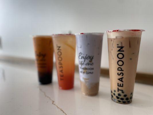 Right to left: house milk tea w/honey boba, taro lover, guava sunset, classic Thai tea w/honey boba