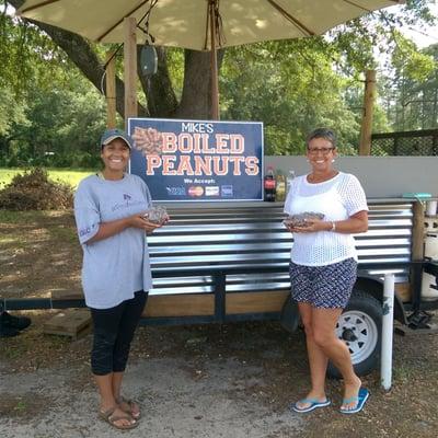 Ms. Peyton and her Mom visiting Mike's Boiled Peanut wagon while on their road trip from N. Carolina.