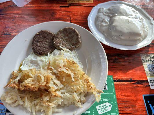 Breakfast special - sausage, eggs, hash browns, biscuits and gravy.