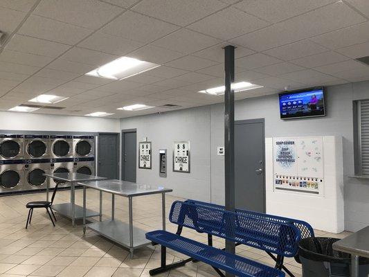 Benches, folding table, vending machine for laundry soaps.