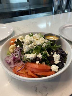 The Greek salad with house made Italian dressing.