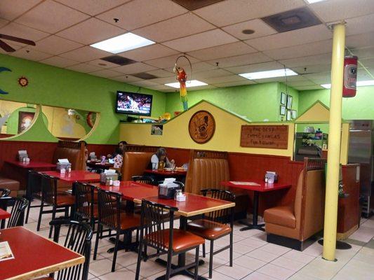 Dining area with the 2 seated tables in the far corner. Not sure if they were seated next to each other on purpose.