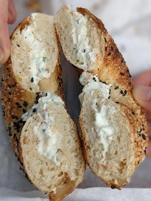 Black sesame bagel and herb spread