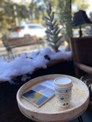 My cozy spot that I enjoy my drink and people watching