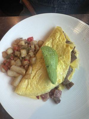 Steak omelette with country potatoes