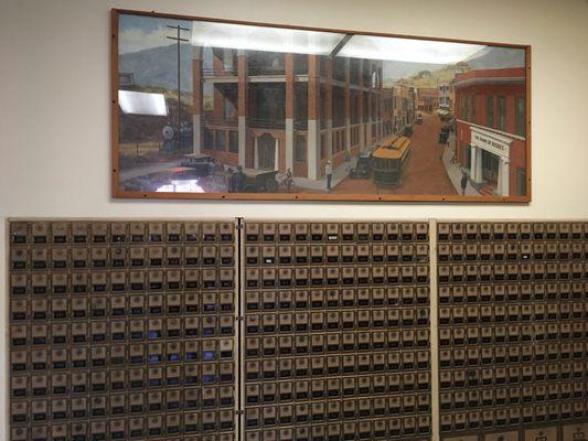 Mail Boxes with old painting above